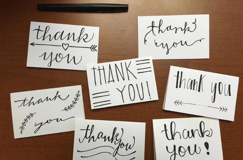 hand-writing Thank You notes