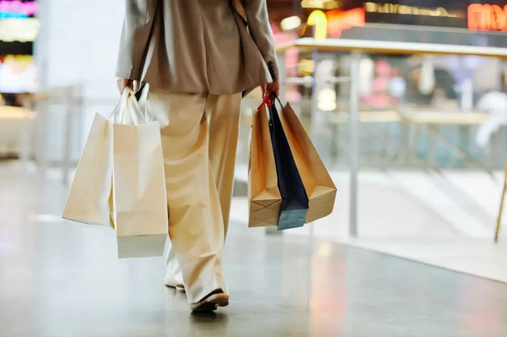 Customer walking after buying  products on the mall 